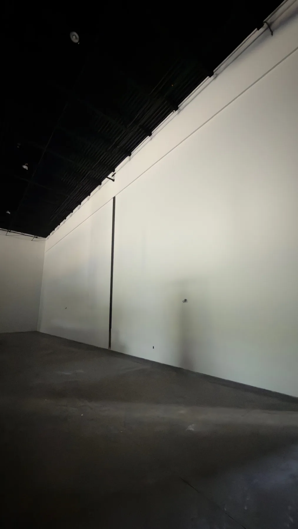 Commercial interior with smoothly finished and painted walls